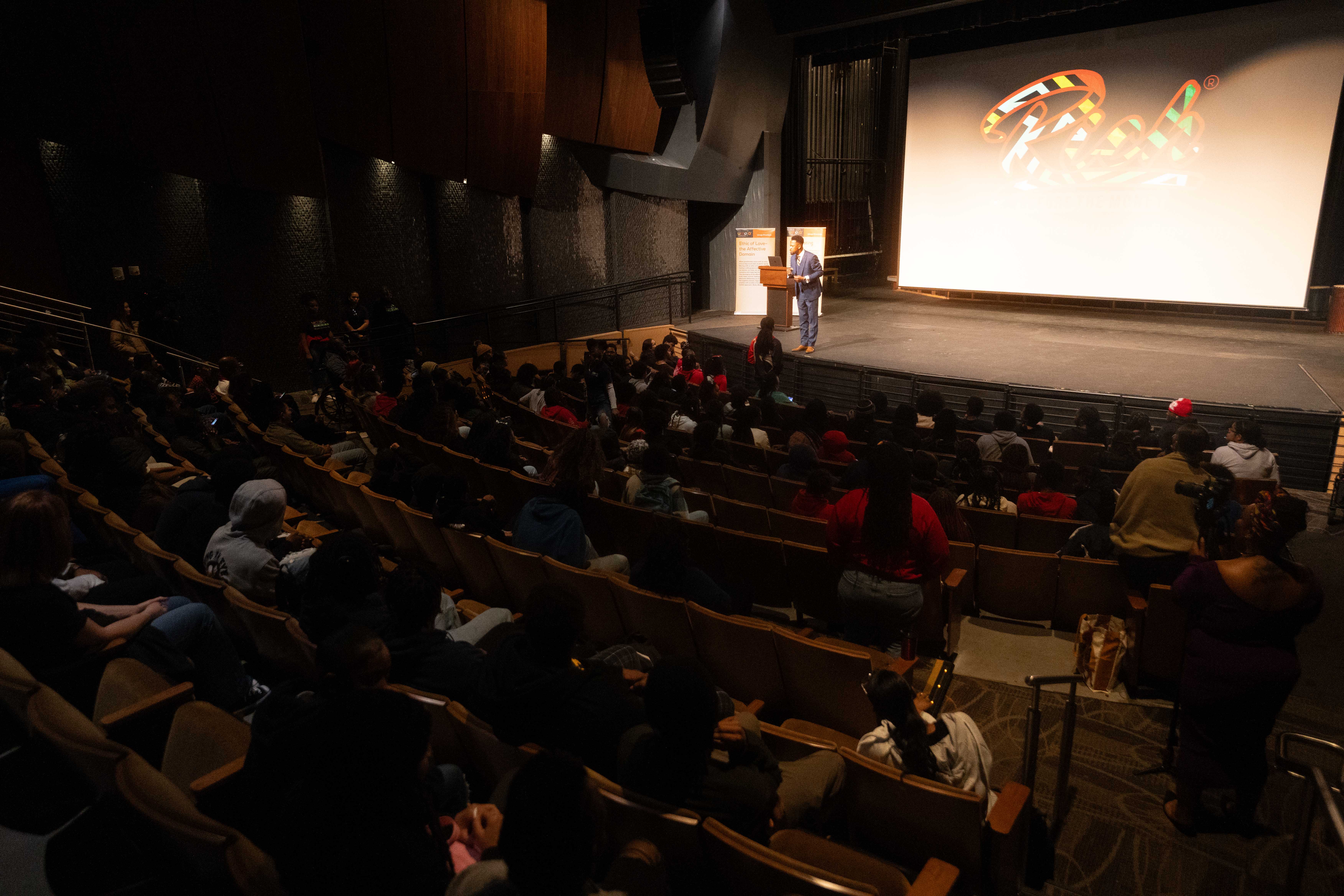 A full auditorium watching Brian E. Sibley speak