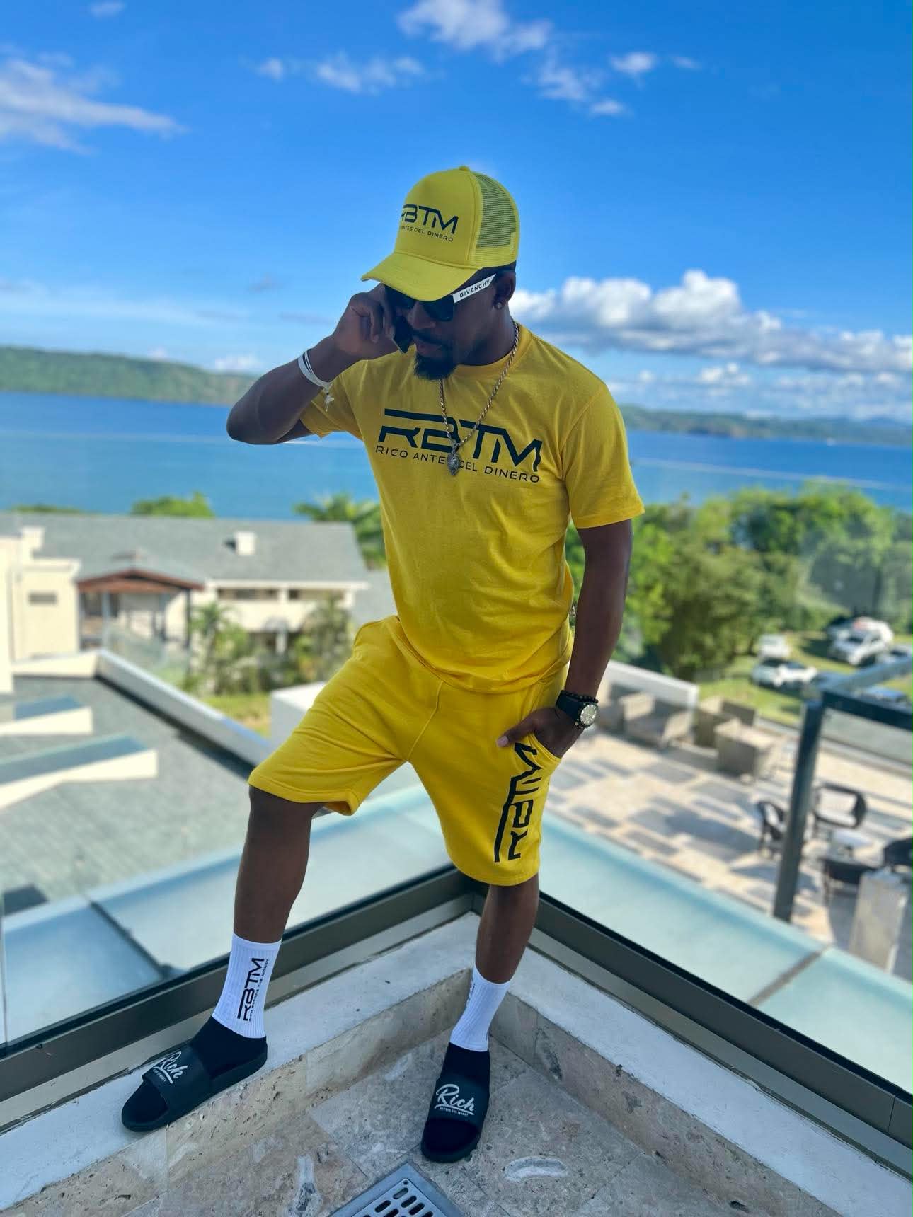 Brian E. Sibley in Rich Before The Money apparel overlooking the coast in Costa Rica