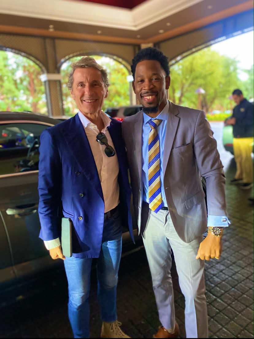 Brian E. Sibley standing with the CEO of Lamborghini