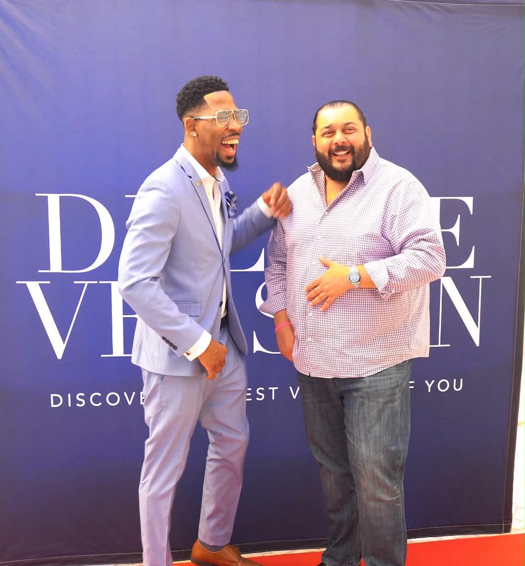 Brian E. Sibley laughing with his mentor Walid at a networking event in Las Vegas